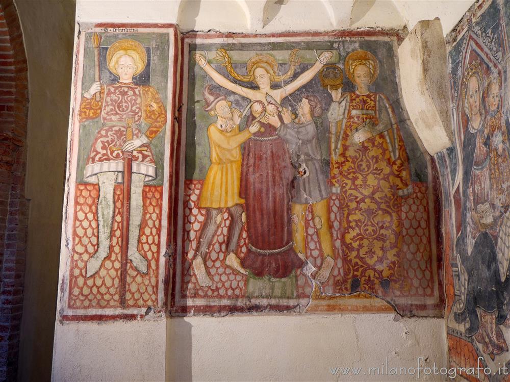 Casalvolone (Novara) - San Defendente, Sant'Agata e Santa Dorotea sulla parete ovest del campanile della Pieve di San Pietro